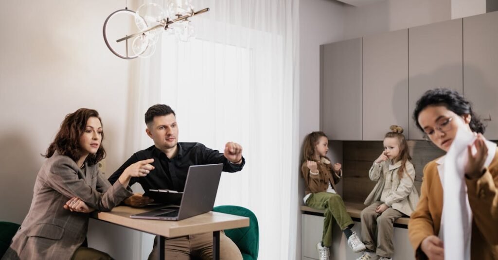 Family discussing real estate purchase inside home with agent and children present.